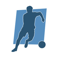 Silhouette of a muscular man playing ball. Silhouette of a male with an athletic body in action playing a ball.