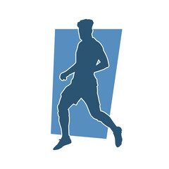 Fototapeta na wymiar Silhouette of a sporty slim male in running pose. Silhouette of a sporty man doing jogging. 