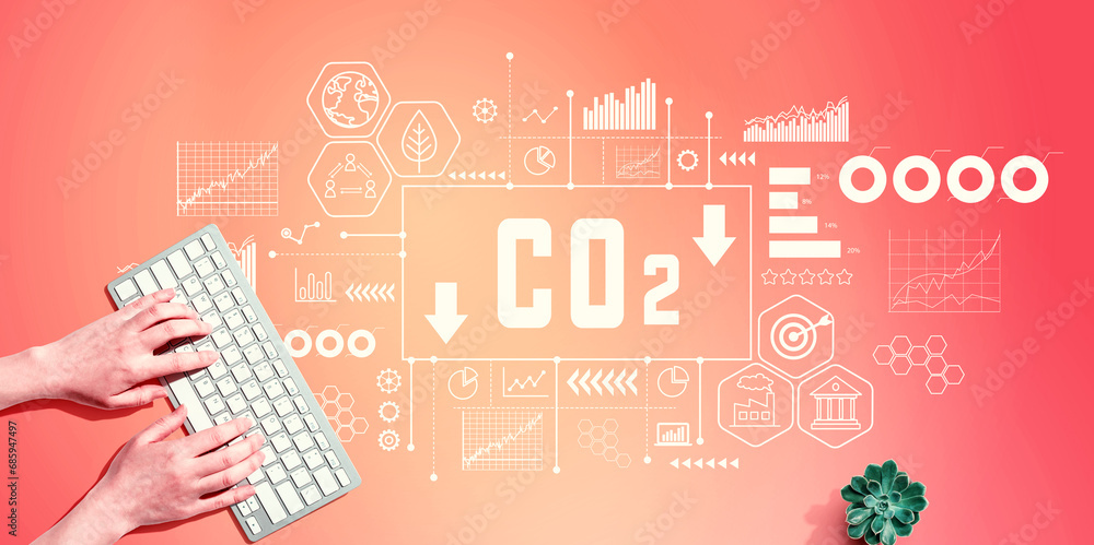 Poster reduce co2 theme with person using a computer keyboard