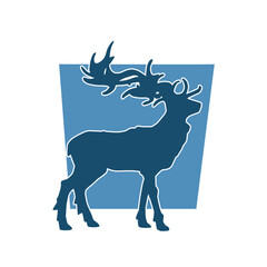 Silhouette of a wild deer forest animal with beautiful antlers. 