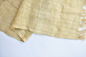 torn sackcloth isolated on white background, burlap fabric texture for design