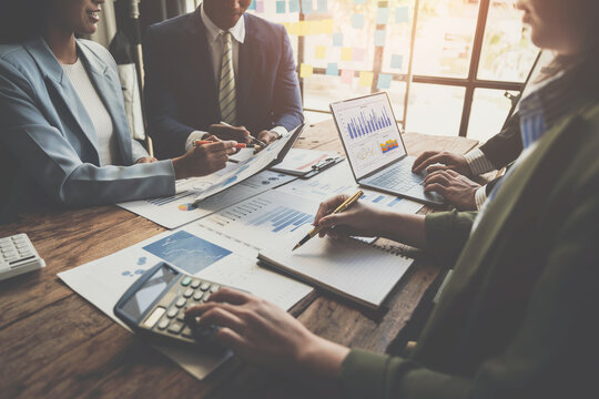 Analyzing results, an accountant, businessman or financial expert analyzes results. Calculates results from graphs, business reports and financial charts. Company stock market.