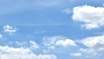 Light blue sky and white clouds. With copy space.	
