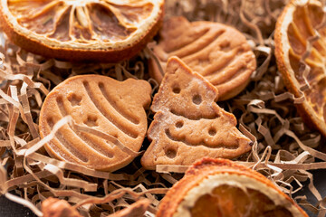 Christmas homemade ginger cookies Christmas snack, cookies in shape of trees and Christmas balls.  Festive food, family culinary. High quality photo, close up, flat lay
