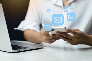 Email marketing concept. Hand of businessman using smartphone , tablet, for email virtual screen. Business digital technology and marketing.	
