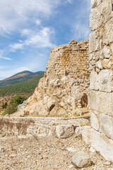 Fototapeta na wymiar Remains of the northern wall in the medieval fortress of Nimrod - Qalaat al-Subeiba, located near the border with Syria and Lebanon on the Golan Heights, in northern Israel