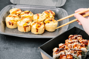 Sushi Roll Set in containers. Takeaway sushi.
