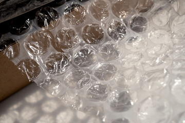 Textured bubble wrap for packaging. Packaging using non-ecological materials.