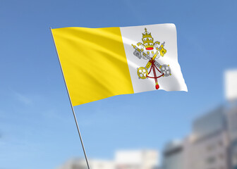 Vatican City flag waving in the wind.