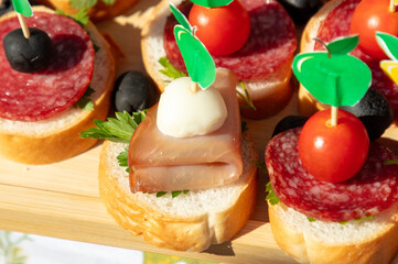 Sandwiches with bread, fish and tomatoes