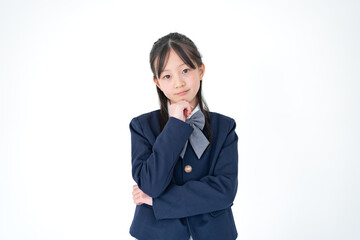 考える学生服を着た日本人の女の子