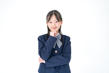 考える学生服を着た日本人の女の子