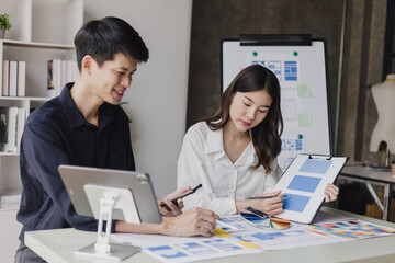 Business teamwork and working with UX developer and UI designer at table in modern office. Creative and development agency concept.