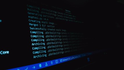Compile process of C code on screen for embedded system - Powered by Adobe
