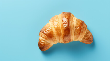 Croissant at blue background