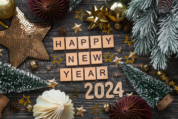 A postcard or banner. A symbol from the number 2024 with paper Christmas tree toys, stars, sequins...