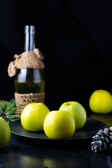 Obraz premium A ripe green apple fruits on dark stone table. Top view with copy space. Flat lay