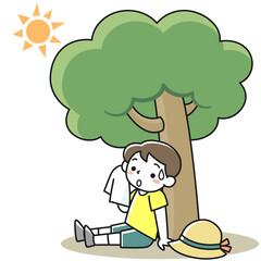 直射日光を避け木陰で休む男の子