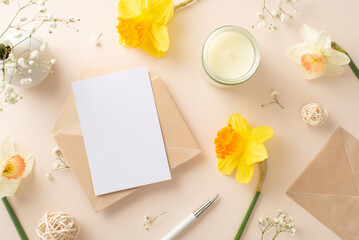 Send warm greetings for spring holidays with daffodils and gypsophila. Top view image showcases...