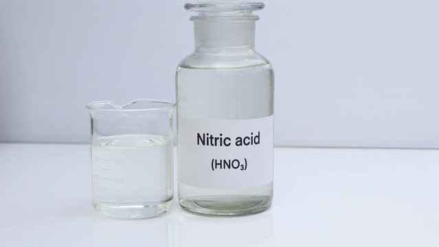 Nitric acid in containers, Hazardous chemicals and raw material, chemical in industry or laboratory