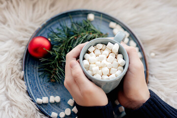 Christmas cup of cocoa with marshmallows. New Year's mood