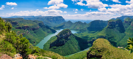Panorama Route South Africa, Blyde river canyon with the three rondavels, impressive view of three rondavels and the Blyde river canyon in south Africa. - Powered by Adobe
