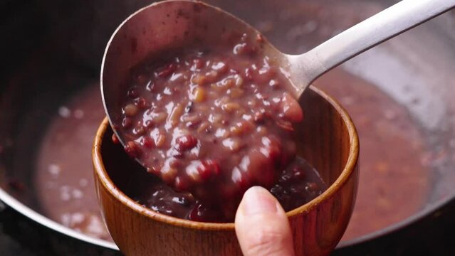 boiled red rice porridge with beans and jujubes. traditional food Laba porridge.