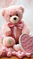 An isolated pink teddy bear sitting beside a heart-shaped box of chocolates, creating a sweet and romantic composition