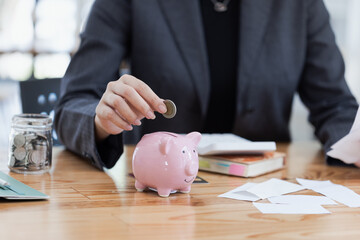 Obraz na płótnie Canvas Piggy bank and saving money concept, Finance banking and saving money.
