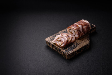 Delicious meatloaf with lard, salt, spices and herbs cut into slices