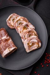 Delicious meatloaf with lard, salt, spices and herbs cut into slices