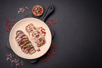 Delicious meatloaf with lard, salt, spices and herbs cut into slices