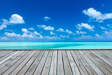  Tropical beach in Maldives. Tropical sea under the blue sky