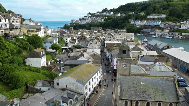 Drone shot of the architecture of Looe coastal town in Cornwall, England