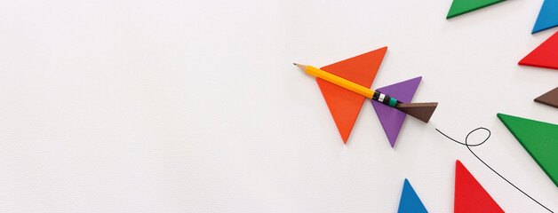 Concept image of a pencil in an airplane metaphor. Idea of leadership and education