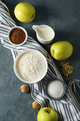 The ingredients are laid out on the table for preparing autumn pastries.