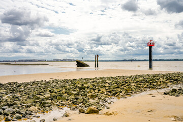 View of the Falkensteiner Ufer and the shipwreck MS Uwe. Historical sight on the Elbe near Hamburg.