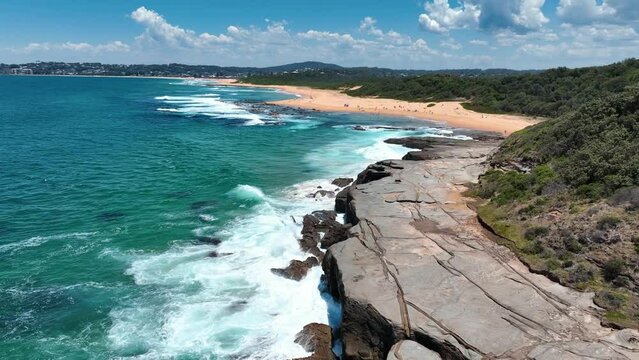 Dramatic Aerials: Spoon Bay's Rocky Coastline Meets the Serene Wamberal Beach, Central Coast, NSW's Nature Reserve