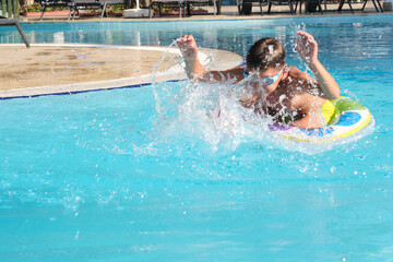 Capturing the essence of summer: animated child swimming with a bright inflatable in a tranquil resort