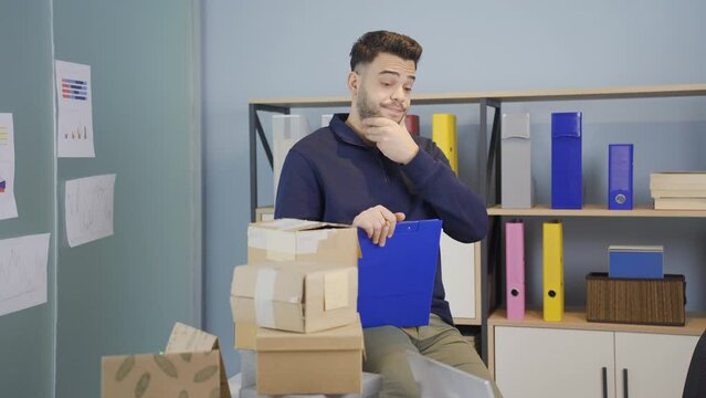 Young entrepreneur who is unhappy and at a loss.