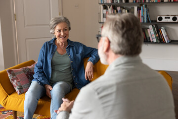 Senior retired woman with personal finance advisor