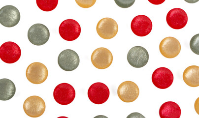 Plastic round multi-colored buttons on a white background