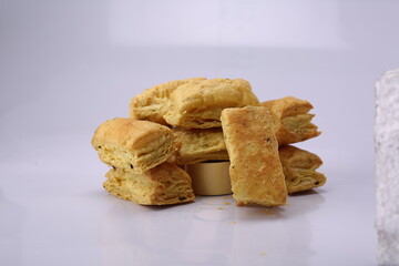 Jeera flavoured Puff pastry Indian khari on white background. High Resolution