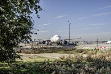 Cargo planes receiving fuel and refueling on the runway
