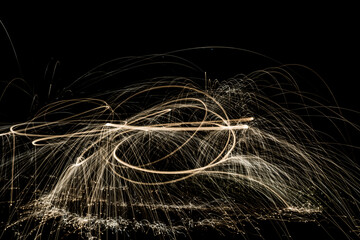 the trail of light  (Photographic technique using low speed with steel wool lit)