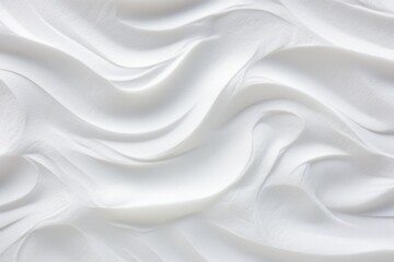  a close up of a white surface with a wavy design on the top of the surface and bottom of the surface.