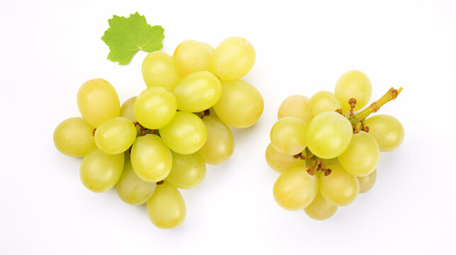 Shine-Muscat grapes chopped on a pale ground, viewed from above.