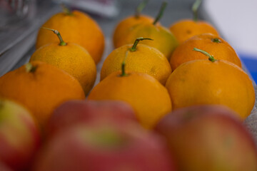 Photo of tangerines lined up in rows