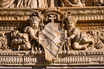 Fototapeta na wymiar Medieval exterior architectural feature of the Santa Cruz Museum. Formerly the Hospital of Santa Cruz in Toledo, Spain