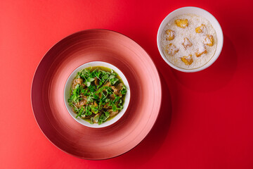 soup with beef and herbs and croutons